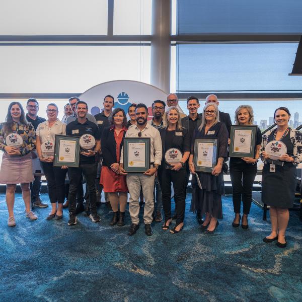 Image of group of people with awards